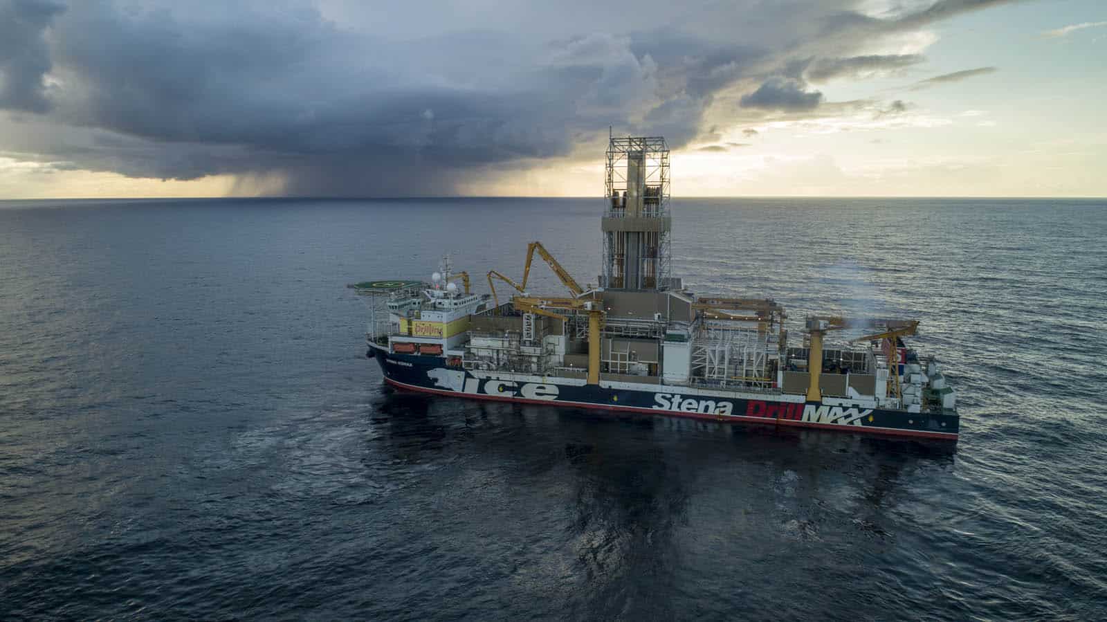 Stena drillmax drillship in the sea with thick cloud and rain