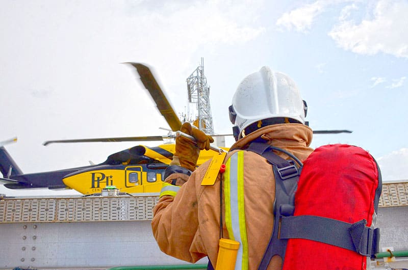 Drillship crew with helicopter